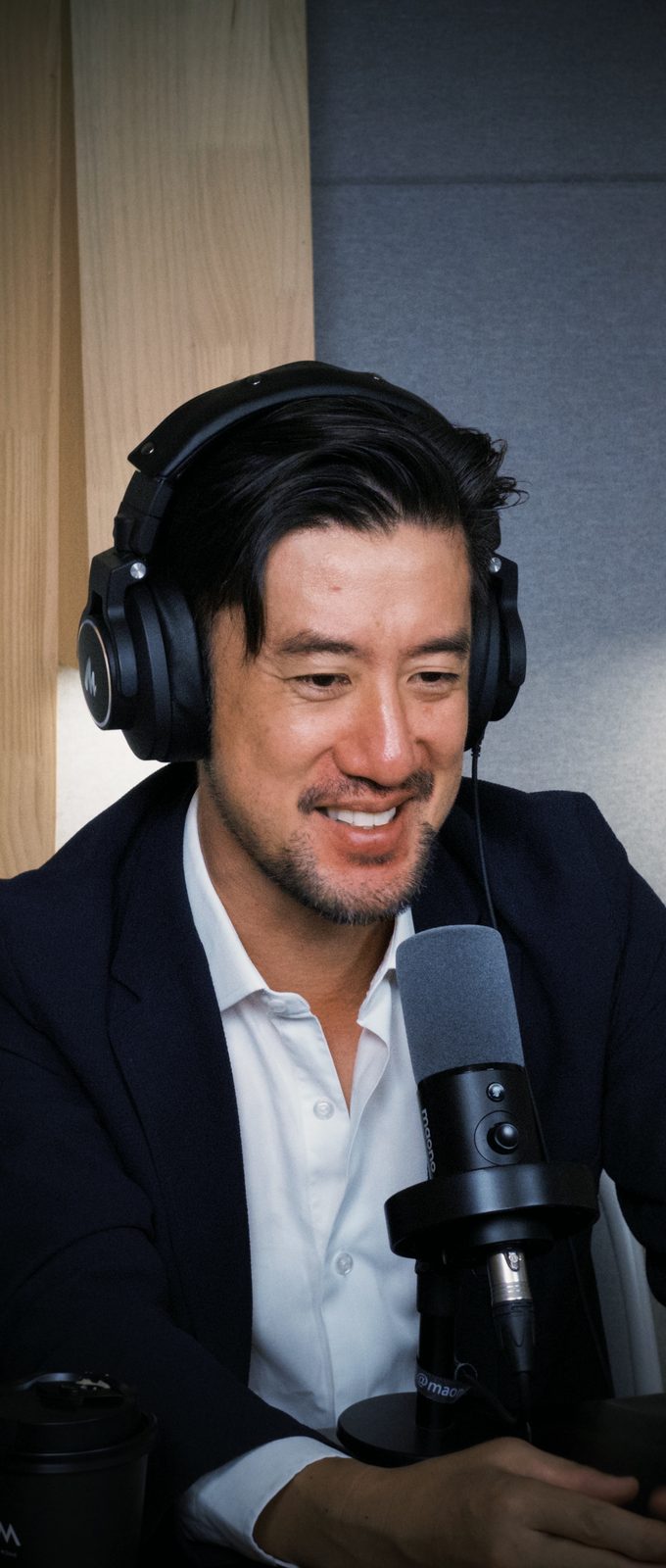 Tak Lo grinning at the mic, the moment he frames South Korea at a 0.85 replacement rate as the leading edge of a regional demographic collapse