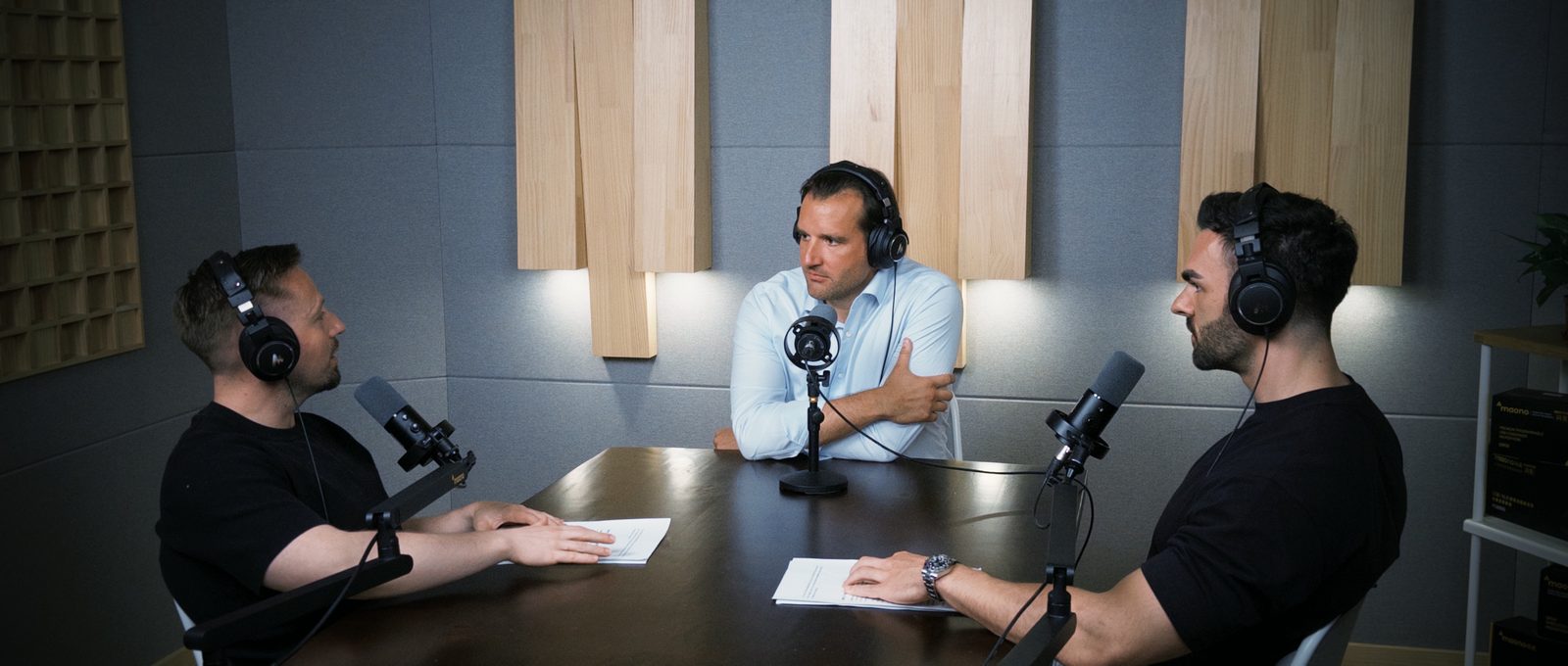 Rafael Ratzel at the head of the table flanked by Thomas and Michael, three-shot opening of the Shenzhen studio recording about the German VC who built a $100M USD China deep tech fund
