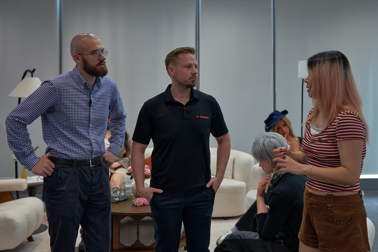 Thomas Derksen of Asiabits with a European client team at humanoid maker Robonova in Shenzhen