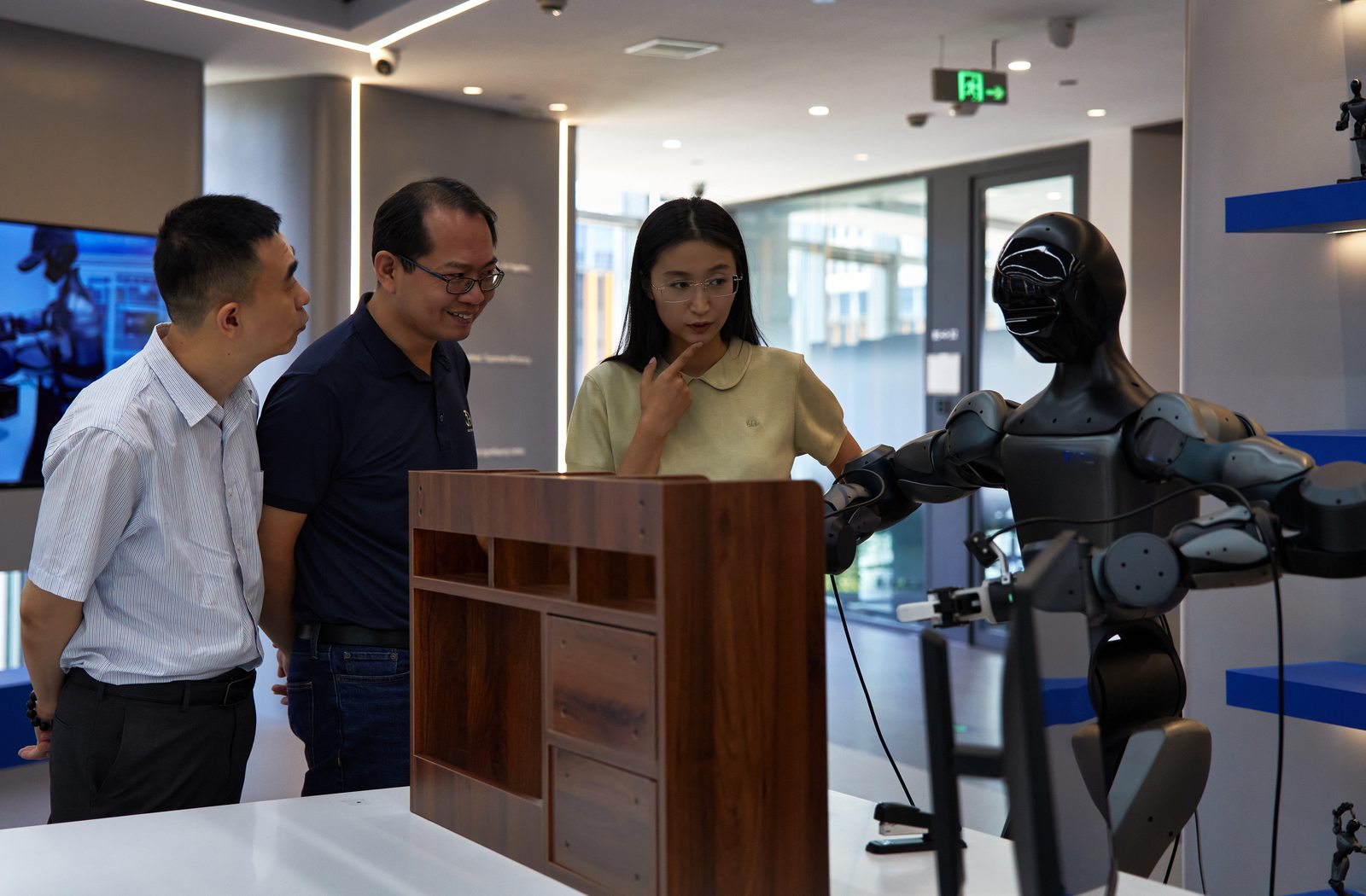 Automotive electronics delegation during a robotics company visit