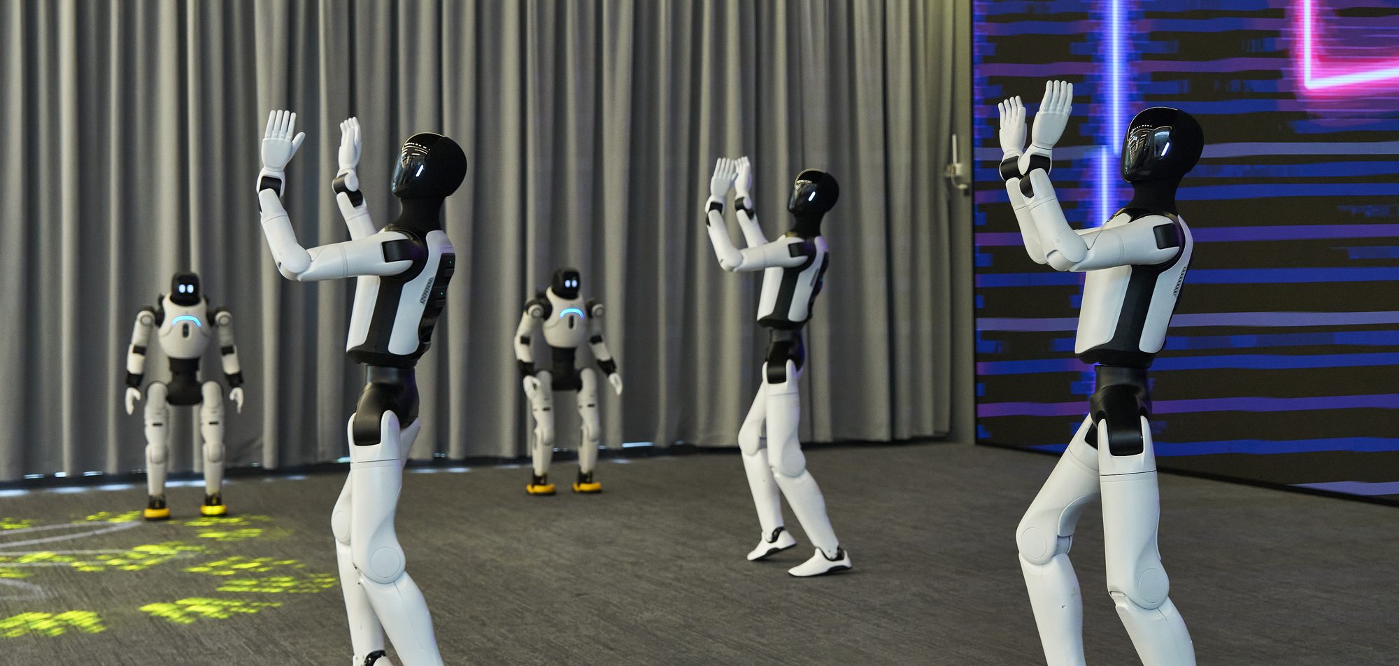 Humanoid robots at an AgiBot visit